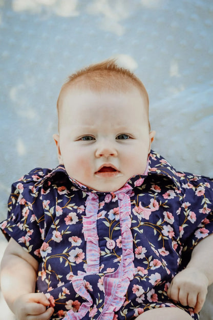 Little Windmill Clothing Co. "Harlo" Naavy Floral Short Sleeve Romper